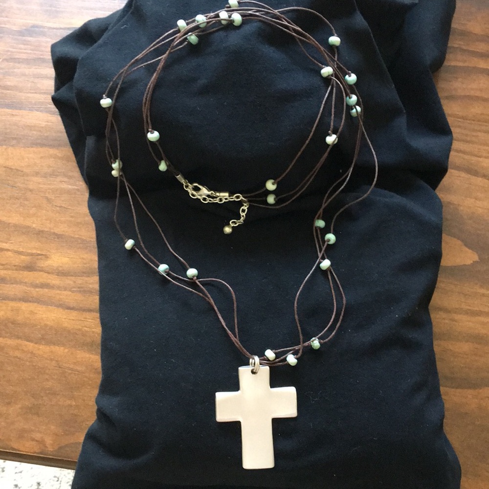 Leather string necklace with silver cross